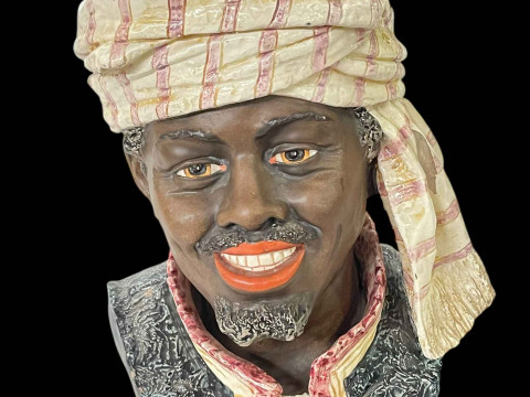 Large pottery tobacco jar in the form of a Moorish man's head.