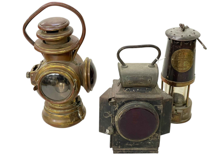 Dietz Dainty Tail Lamp, AJ & R Oldfield Dependance Oil illuminating tail lamp and protector lamp, and Light Co miners lamp (3).