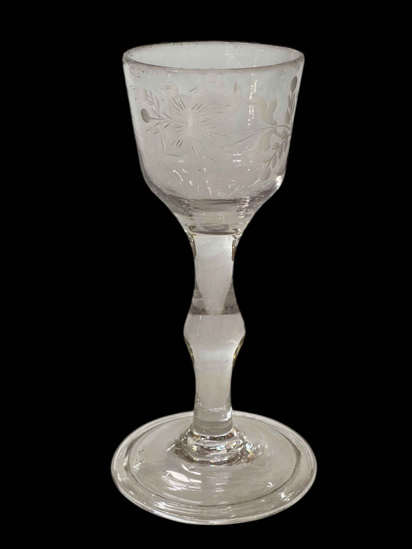 19th Century wine glass with etched bowl, knopped stem and folded foot.