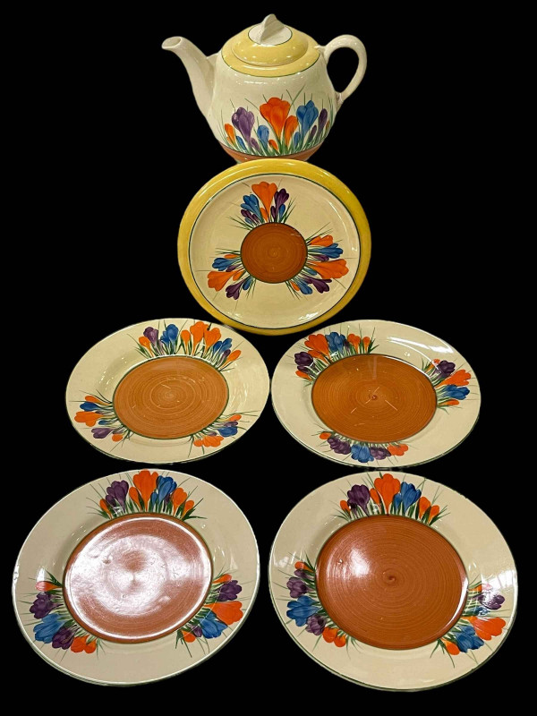Clarice Cliff Crocus pattern teapot, stand and four plates.