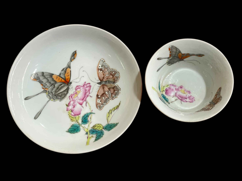 Chinese tea bowl and saucer, well painted with butterflies and flower.