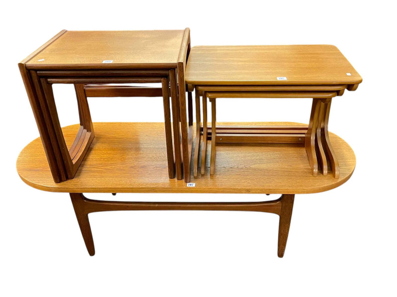 Mid Century oval teak coffee table, G Plan nest of three teak tables and Valco nest of three teak tables.