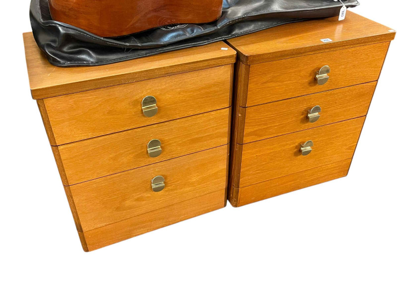 Pair teak three drawer pedestal chests, 63cm by 56cm by 43.5cm.