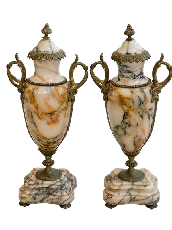 Pair of decorative marble and gilt metal lidded urns, 37cm.