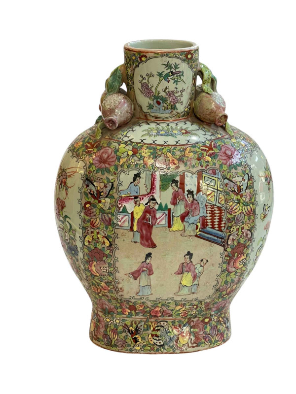 Large Cantonese 19th Century flask shaped vase decorated with figures in panels surrounded by flowers and butterflies, the short cylindrical neck flanked with pomegranates, 40.5cm.