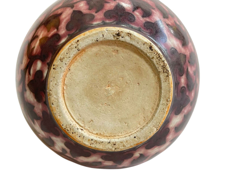 Chinese pottery ewer with flower and leaf design.