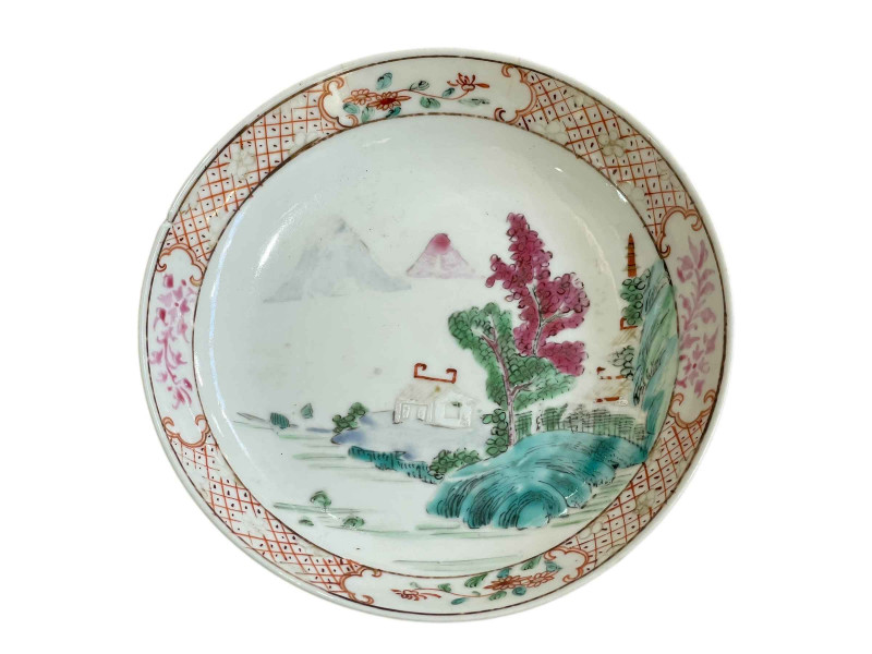 Chinese famille rose saucer dish decorated with landscape scene, 14cm diameter.