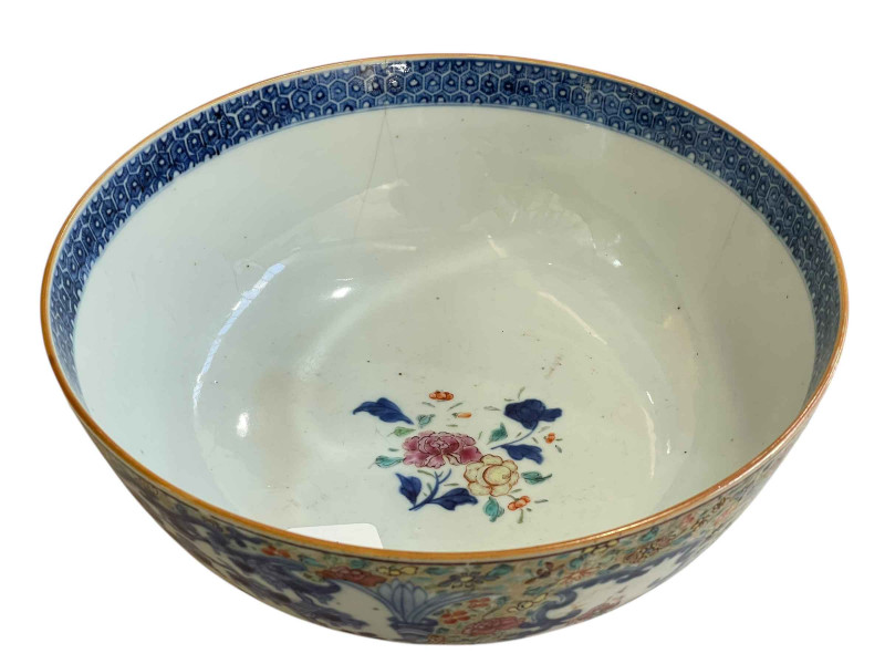 Large Chinese famille rose bowl decorated with figural panels surrounded by flowers, 26cm diameter.