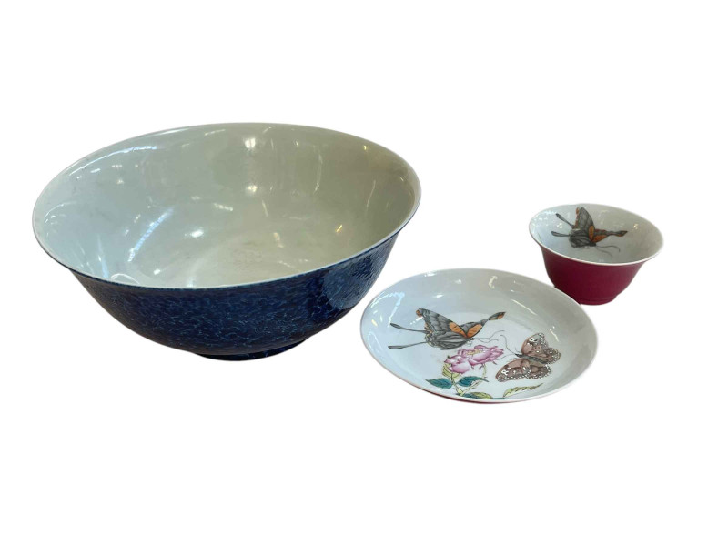 Chinese tea bowl and saucer, well painted with butterflies and flower, along with a Chinese blue outer glazed bowl, six character mark, 20.5cm diameter.
