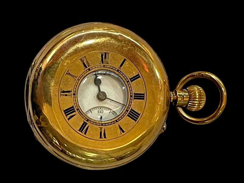 9 carat gold keyless half hunter, the dial signed Benson, London.