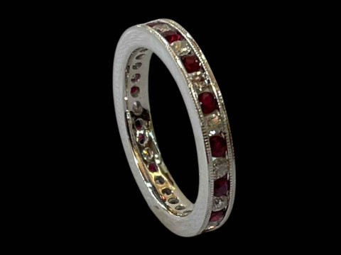 Diamond and ruby 9 carat white gold eternity ring, size N. thumbnail