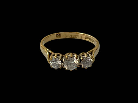 WITHDRAWN            Cubic Zirconia three stone 9 carat gold ring, total...