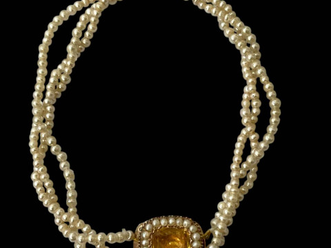 Seed pearl mourning bracelet with citrine set clasp.