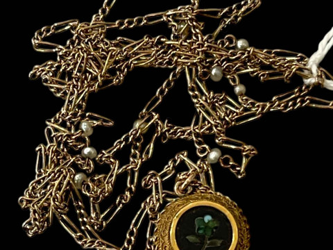 Gold mounted pietra dura locket, 15mm diameter, with long gold seed pearl...