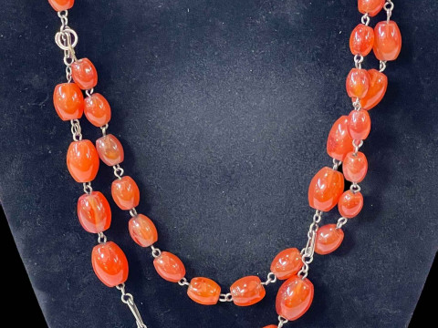 Silver and carnelian bead necklace.