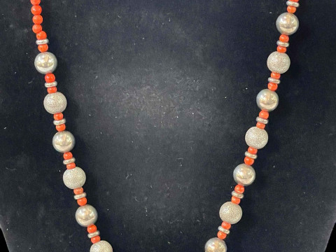 Eastern silver and coral brass necklace.