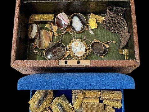 Collection of gilt clasps, cameo and agate stones.