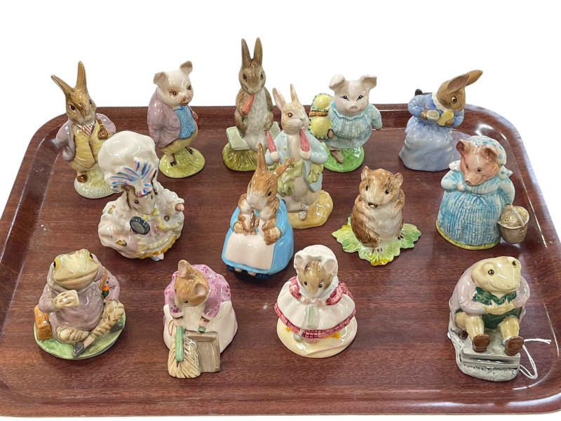 Fourteen Royal Albert and Beswick Beatrix Potter characters.