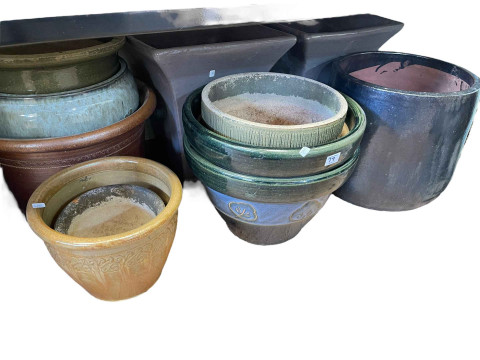 Pair of garden griffin's and collection of pottery and other garden planters. thumbnail