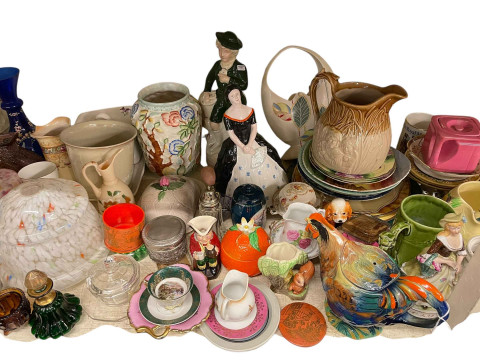 Full shelf of glass and china including Ringtons caddies, ornaments, figurines, vases, etc. thumbnail