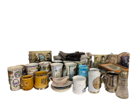 Full shelf of glass and china including Carnival Glass, relief moulded jugs, Wallace & Gromit ornaments, Dunoon mugs, etc. thumbnail