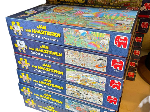 Twelve Jan Van Haasteren comic jigsaw puzzles (unchecked).