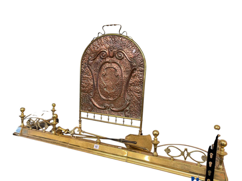 Brass extending Victorian fender, copper and brass Art Nouveau fire guard and three fire irons.