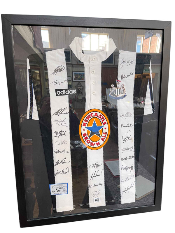 Framed and signed Newcastle United 1995/96 Season home shirt with signatures including John Hall, Alan Shearer, Peter Beardsley, Lee Clark, Kevin Keegan and Terry McDermott.