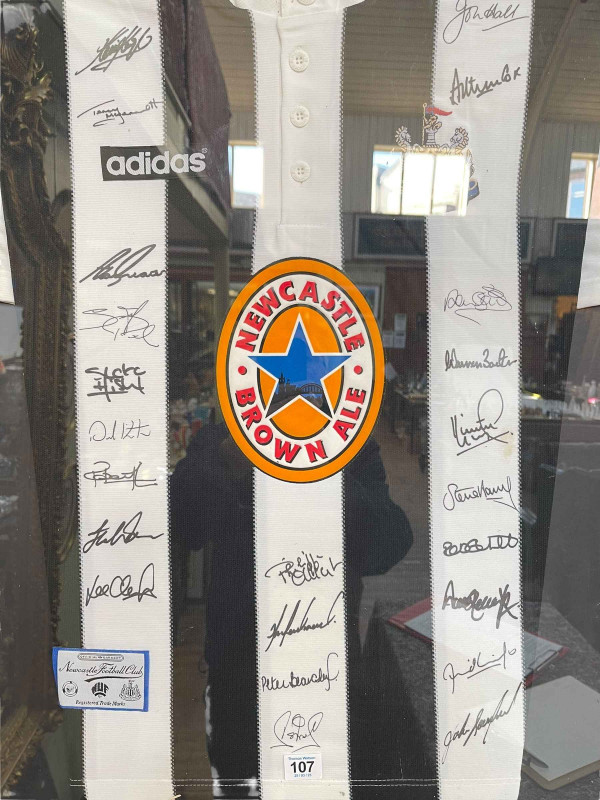 Framed and signed Newcastle United 1995/96 Season home shirt with signatures including John Hall, Alan Shearer, Peter Beardsley, Lee Clark, Kevin Keegan and Terry McDermott.