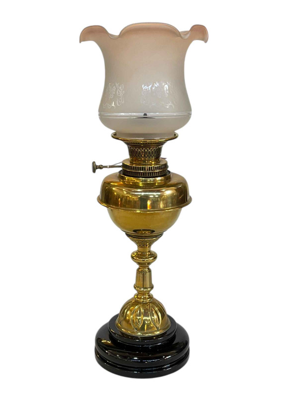 Art Nouveau brass oil lamp with frosted and etched glass shade.