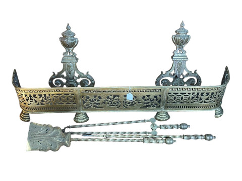 Victorian pierced brass fender, pair of large brass fire dogs and set...