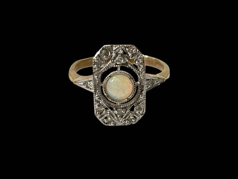 Opal and diamond 9 carat gold ring, size N/O.