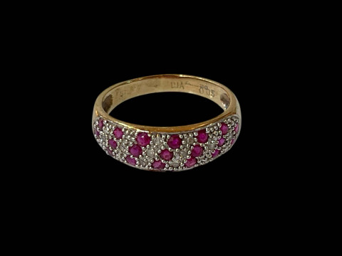 Ruby and diamond 9 carat gold ring, size N.