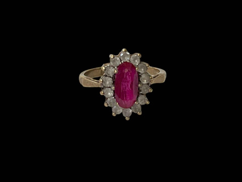 Ruby and diamond 9 carat gold ring, size N.