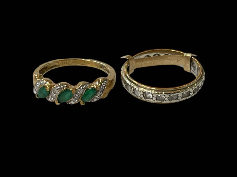 Emerald and diamond 9 carat gold ring, size K, and 9 carat gold eternity...