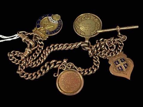 9 carat gold double albert with four gold medals including Durham Football...