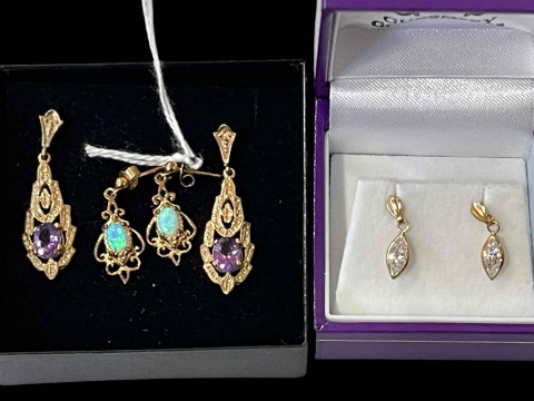 Three pair of gem set earrings.
