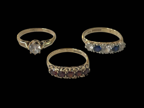 9 carat gold garnet five stone ring, 9 carat gold, sapphire and white...
