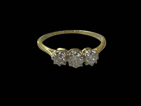 Diamond three stone 18 carat gold and platinum ring, size I.