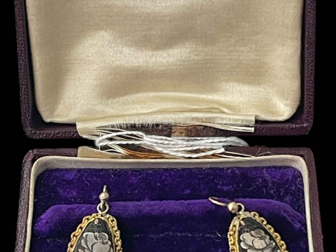 Pair gold and silver inlaid earrings.