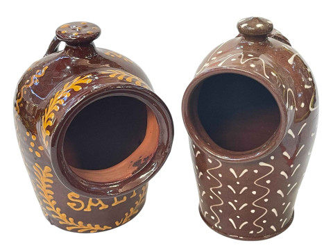 Two slipware salt pots.