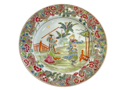 Chinese famille rose plate decorated with figures in a garden with floral...
