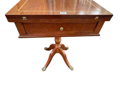 Polished mahogany and line inlaid envelope card table having frieze drawer...