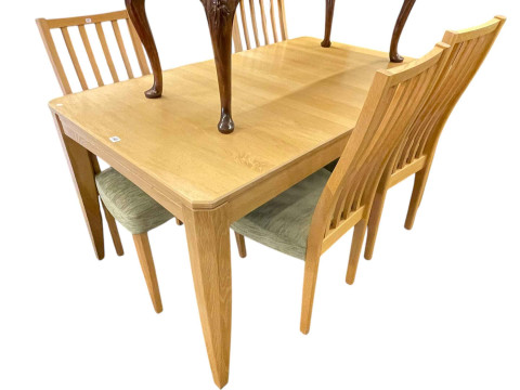 Ercol light oak extending dining table with integral leaf, 74cm by 85.5cm...