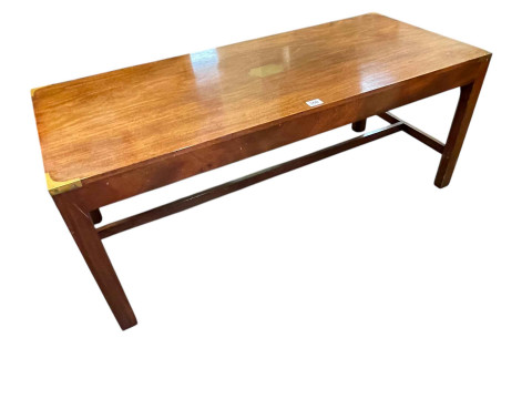 Brass bound rectangular coffee table, 43cm by 107cm by 46cm.