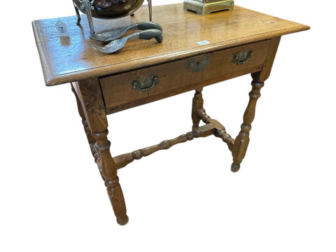 Georgian oak side table having frieze drawer and raised on turned legs,...