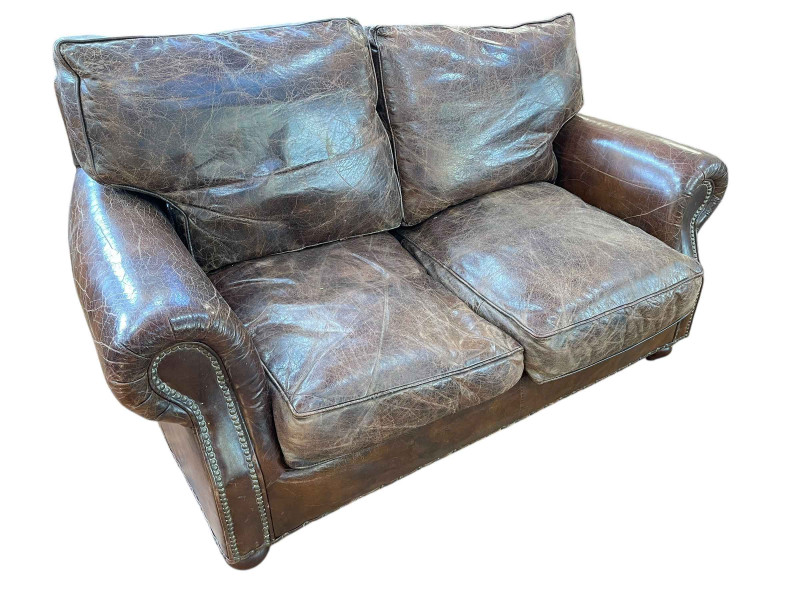 Vintage Timothy Oulton Halo brown leather two seater sofa, 150cm by 95cm by 85cm.