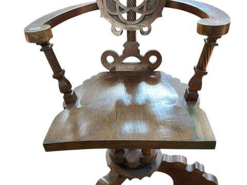 Early 20th Century carved swivel desk chair.