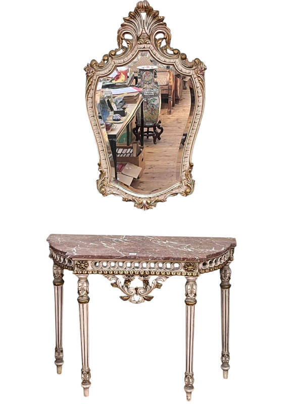 Continental marble topped bow end console table and bevelled wall mirror, table 72cm by 90.5cm by 32cm, mirror 95cm by 56cm.