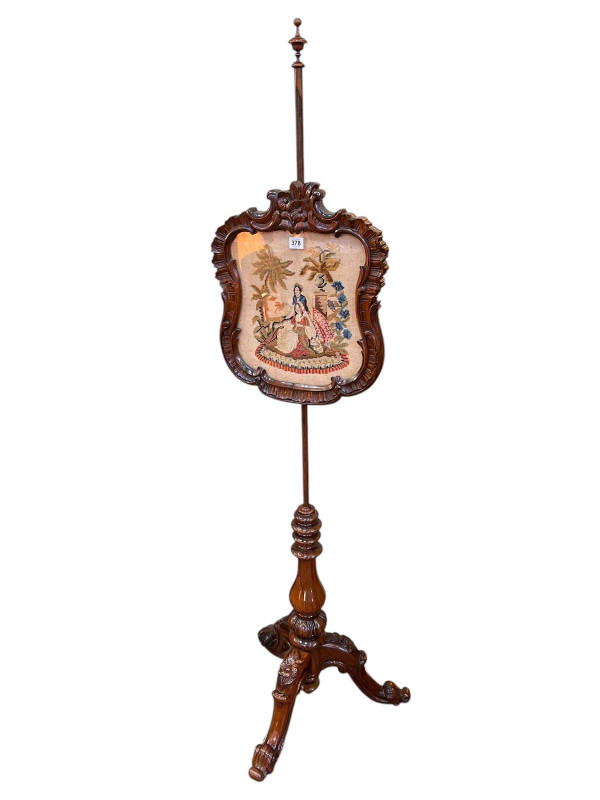 Victorian carved rosewood triform pole screen with glazed needlework panel, 171.5cm.